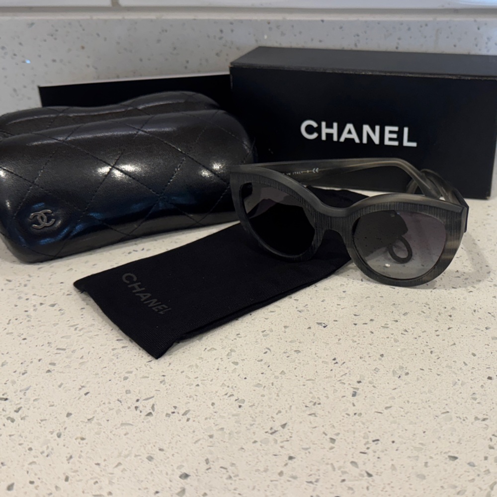 CHANEL Elegant Black Sunglasses with Quilted Case